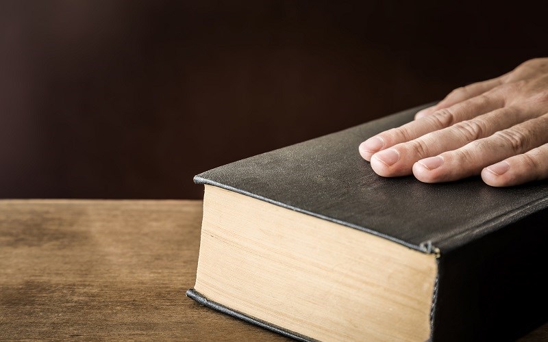 The Irony of Refusing to Swear in on the Bible